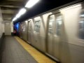 R160 Alstom Q train entering Canal Street