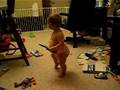 Katie plays with remotes