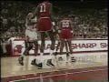 Scottie Pippen dunks on Manute Bol