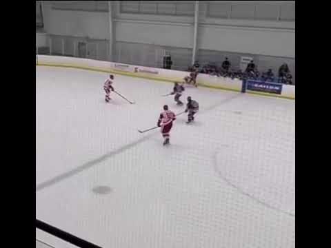 Daud Musaev Delivers a Hip Check that Sends Opponent off the rink