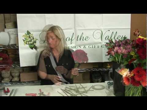 Flowers - To make a bridal bouquet, choose the color theme and flowers, remove all greenery from the flowers, start with the largest bloom in the center and spiral the...