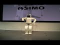 Honda's Asimo robot dances at the Honda Showroom in Tokyo, Japan.