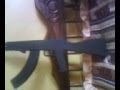 unefa lara Ak 103 de madera con cuchillo.