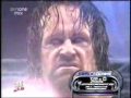 Mini Taker takes a Chokeslam from The Undertaker. Funny.