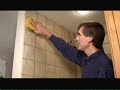 In this video, Mark Donovan of HomeAdditionPlus.com shows how to grout tile in a custom tiled shower.