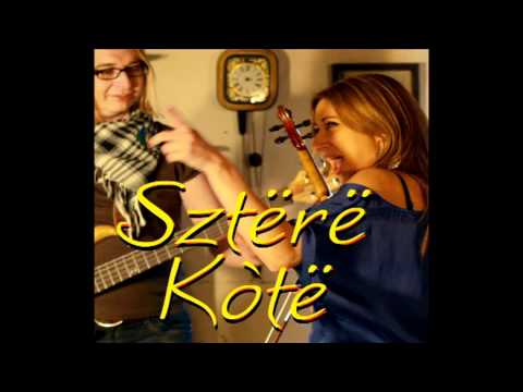www.facebook.com/szterekote

Dzéwczëcé wróżbë

Na kamiszkù sedzała,
kwiôtczi so ùkłôdała,
kwiôtczi, kwiôtczi ùkłôda,
i sã baro dzëwòwa.

Lala la lala la, lala lala la lala lala

Na kamiszkù sedzała,
płatk pò płatkù skùbała,
płatk pò płatkù skùbała,
z kwiô