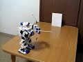 i-SOBOT shoots an arrow.