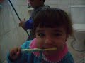 Opera��o escovar os dentes