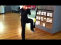 TRX single leg squat with driving leg in and out - Keep tension on the leg in the TRX and as you come out of your squat drive your knee of the leg in the TRX up towards chest.