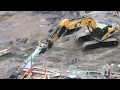 Cat 330DL Excavator Hammering Soft Concrete