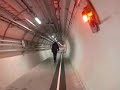 the man who compared himself to a proton ! on 20 may, gianni motti went down into the lhc tunnel and walked around the 27 kilometres of the underground ring at an average, unaccelerated pace of 5 kph.