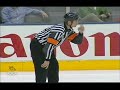 Ron Wilson yells at referee Chris Lee, and gets booted as a result.. Wilson was upset at the fact that 2 penalties called on the Leafs (holding and slashing) were in fact holding and slashing by the opposition. Furthermore, he thought 3 interference penalties were uncalled on the last shift.
