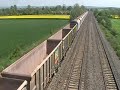 Due to a fatality near Newbury on the Berks & Hants line, freight that were being hauled by 59s were being diverted via the GWML as a result. Here we see DB Red 59206 (my first sighting!!!) with 59005 behind it, cruising through Cholsey's Manor Farm Bridge with a tone & a wave out the window from a very nice driver. Cheers! Enjoy! :)