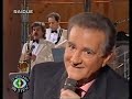 teddy reno canta conoscerti canzone di giovanni d'anzi con la quale arriva terzo al festival di sanremo in coppia con achille togliani; incisa anche da luciano tajoli e luciano virgili.