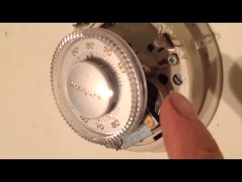 how to adjust old honeywell thermostat