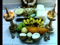 Vishu is a festival held in the state of Kerala (and adjoining areas of Karnataka and Tamil Nadu) in India around the first day in the Malayalam month of Medam (April -- May). This occasion signifies the Sun's transit to the zodiac Mesha Mesha Raasi as per Indian astrological calculations. Vishu is also considered as the Malayalam New Year day and thus the importance of this day to all Malayalees regardless of their religion or sect. The festival is marked with offerings to the divine called Vishukkani. The offerings consist of a ritual arrangement in the puja room of auspicious articles like raw rice, fresh linen, golden cucumber, betel leaves, arecanut, metal mirror, the yellow flowers konna (Cassia fistula), and a holy text and coins, in a bell metal vessel called uruli. A lighted bell metal lamp called nilavilakku is also placed alongside. This arrangement is completed the previous night. On the day of Vishu, the custom is to wake up at dawn and go to the puja room with the eyes closed so that the Vishukkani is the first thing one sees. Since the occasion marks the beginning of Malayalam New Year, it is also considered auspicious to read verses from Hindu Holy book Ramayanam after seeing the 