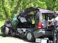 fatal crash in massillon, ohio when a firetruck, on the way to a car fire, hits a van. kills grandfather and grandson in van. four massillon firefighters were injured.