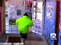 Surveillance Video Captures Robber, Clerk Shootout