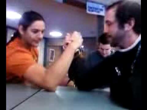 Nigle and Coach arm wrestling