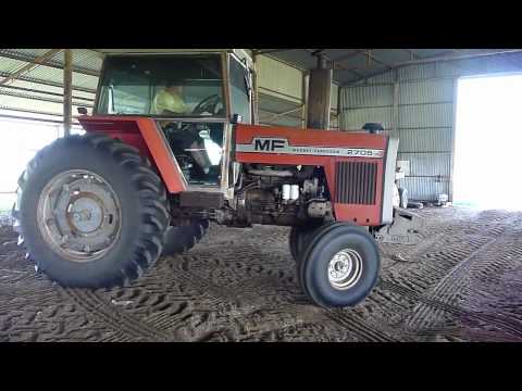 tractor - Massey Fergason 2705 Farm Tractor raking hay. Be shure to watch in HD and hit subcribe.