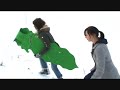 mint sledging action on snow and massive sand dunes set to lively music