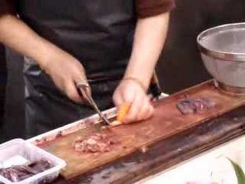 deft fishmonger at Tsukiji fish market