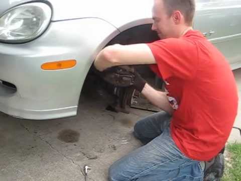 How to change disc brakes in 10 minutes on a 2002 Dodge Neon R/T.       8-8-12 Far Reach FR