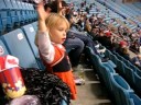 In this short one she is trying to get the attention of the balloon dropping prizes on the crowd.