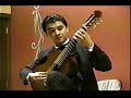the cuban- mexican classical guitar player manuel espin�s performance during the international guitar festival in paracho, michoac�n, m�xico, in the year 2004.
playing andante op.64 by napole�n coste, gavotte choro, valsa choro, and mazurka choro by heitor villa-lobos and finally sonatina meridional by manuel m. ponce.