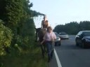 A Vagiant rides a horse to work.  In doing so, she is saying 