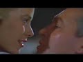 hitchcock is a master. he begins with a smartly choreographed pan across the rear window set.  its paced perfectly with a neighbor singing her scales.  grace kelly's soft shadow rises over the last light of a summer's day that rests on stewart's sleeping face ... hitchcock adores kelly and shapes the film to make her look like part of a dream. pure grace. he wakes us  softly with her kiss first then her voice. stewart and kelly exchange caring wit. 