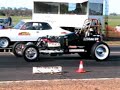 hambster on the 1/8 mile track  9.42 sec pass side view, up against a tonana