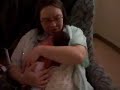 Mom Holds Son