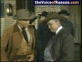 before the credits, mr. cameron of cameron's general merchandise tells a man in his store that he won't buckle under anybody's threats. 