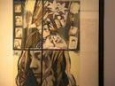 Romanian-born artist and Connecticut resident FlorinIon Firimita talks with Sr. Jo-Ann Iannotti about his works on display at the Marie Louise Trichet Art Gallery at Wisdom House.  Entitled 