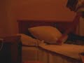 Beating drunken friend with a pillow