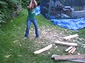 Rafaela chops wood