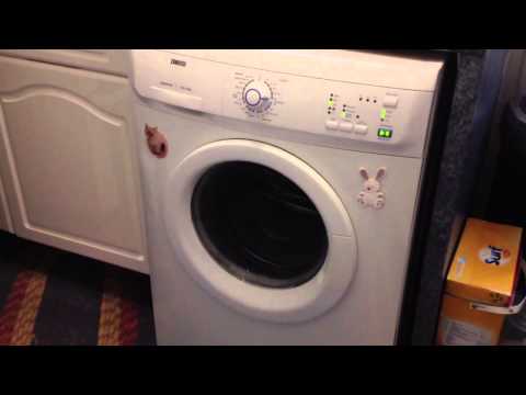 how to open a zanussi washing machine door