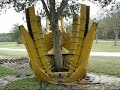 Newly dug live oak tree being moved to basket to harden off for sale to home owner