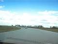 driving around the track in a cayman