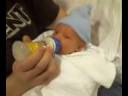 Daddy feeds Ashton