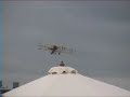 a replica curtiss pusher biplane goes thru its paces