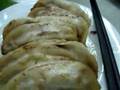 three Chinese dude and some fried dumpling