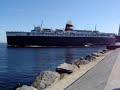 S.S. Badger coming home past Ludington Lighthouse