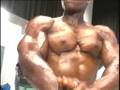 IFBB pro bodybuilder Daron Lytle poses backstage