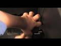 Little Person putting on Pedal Extenders