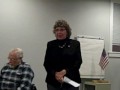 Phyllis Woods introducing Saul Anzis at the Rochester GOP meeting