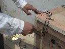 Fixing a claw on a box