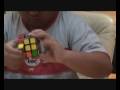 8 year old kid solves rubik's cube video