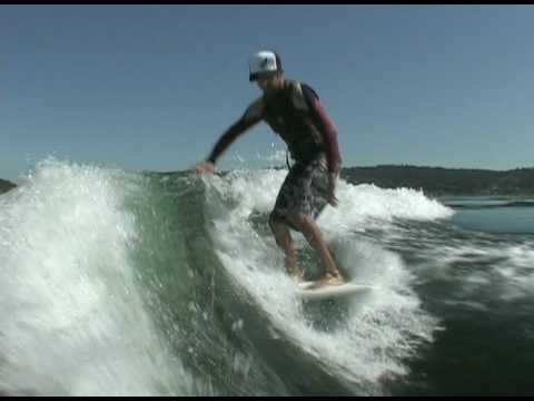 Sean riding Inland Surfer boards behind Centurion Enzo